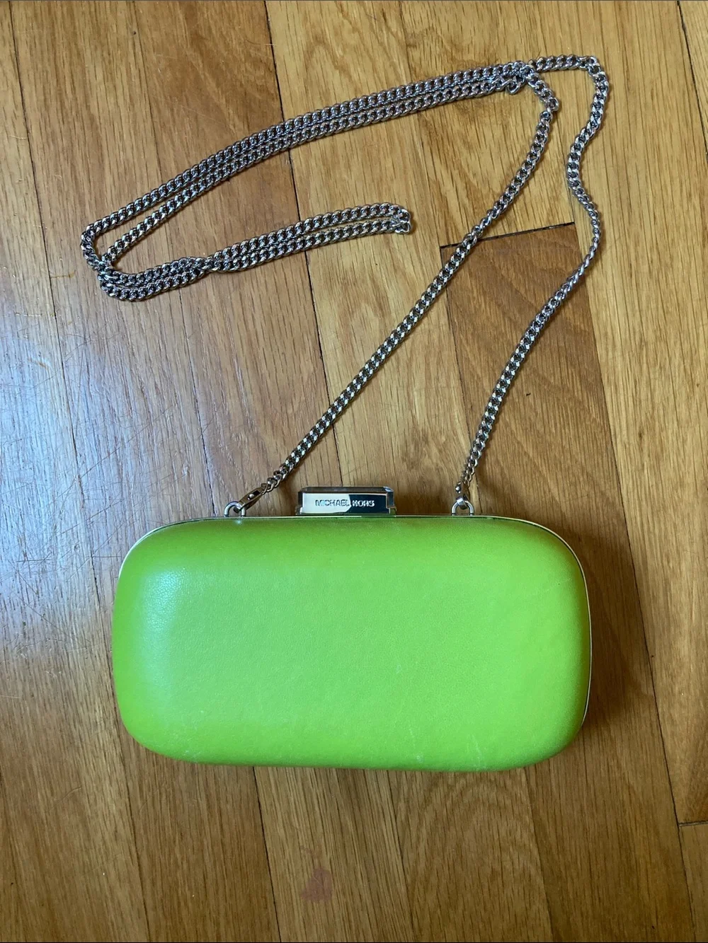 Michael Kors Lime Green Chain Strap Clutch with white bag protector